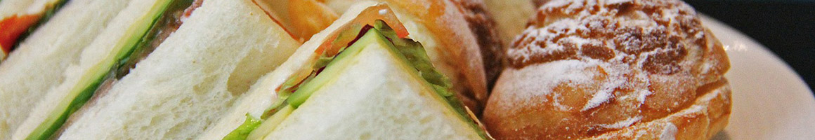 Eating Deli Sandwich at Hartford Giant Grinder restaurant in Niantic, CT.